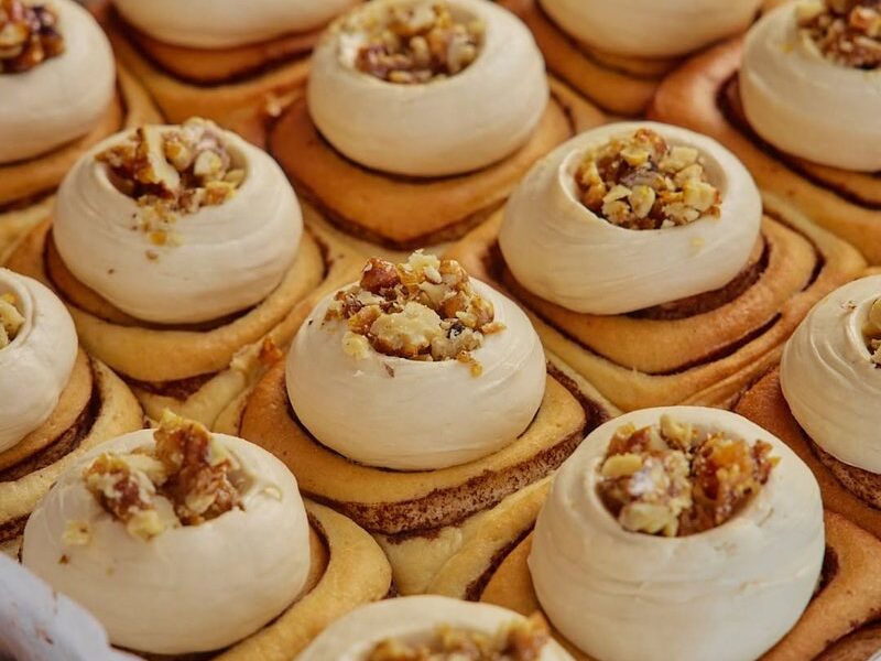 A tray of maple and walnut scrolls with maple frosting
